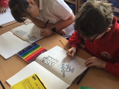 Image of Year 6 (Class 16) - Art - Lettering Styles